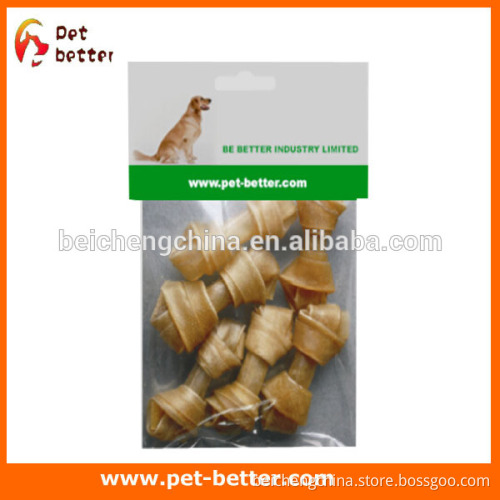 HEALTHY Dog chewing knotted bone dry dog food